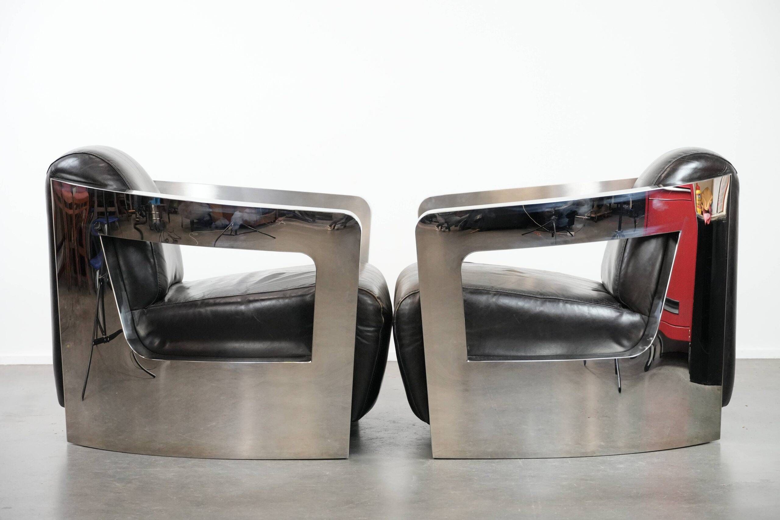 Set of two cowhide leather Aviator design armchairs with aluminium