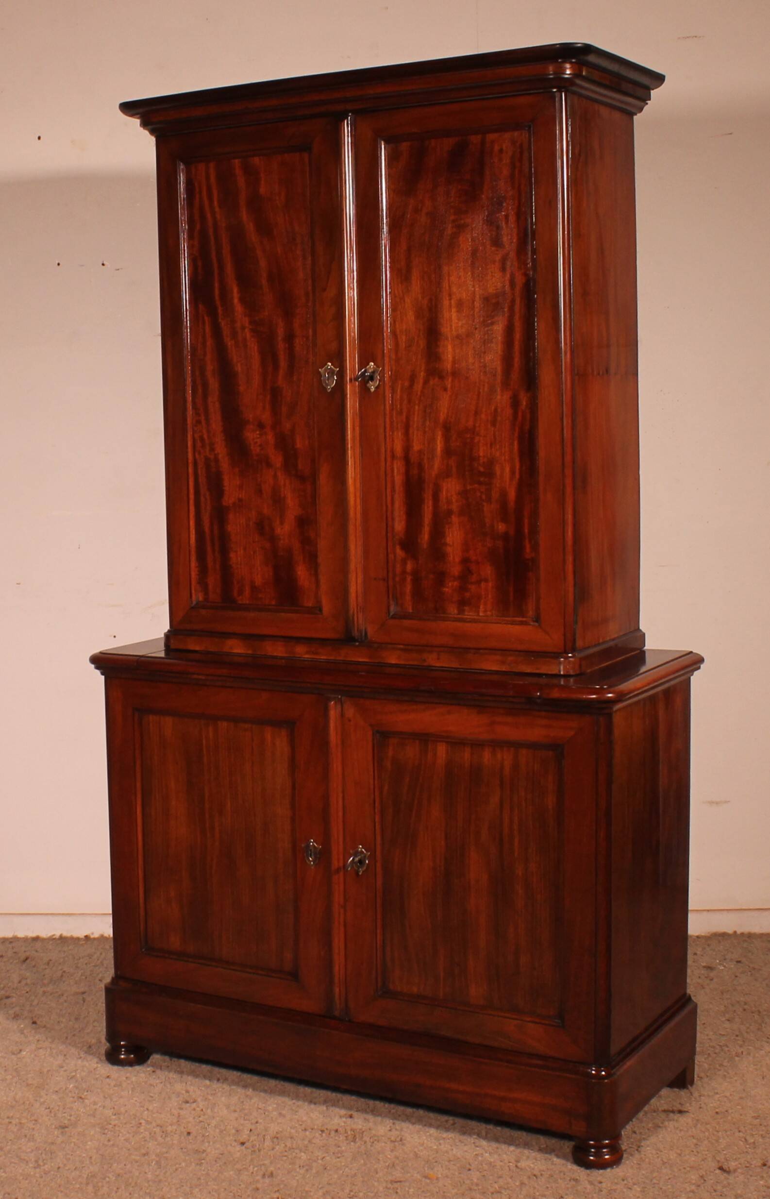 small two-body solid mahogany desk from the early 19th century with writing surface