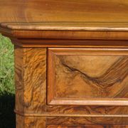 Walnut and walnut burl commode in Louis Philippe style.