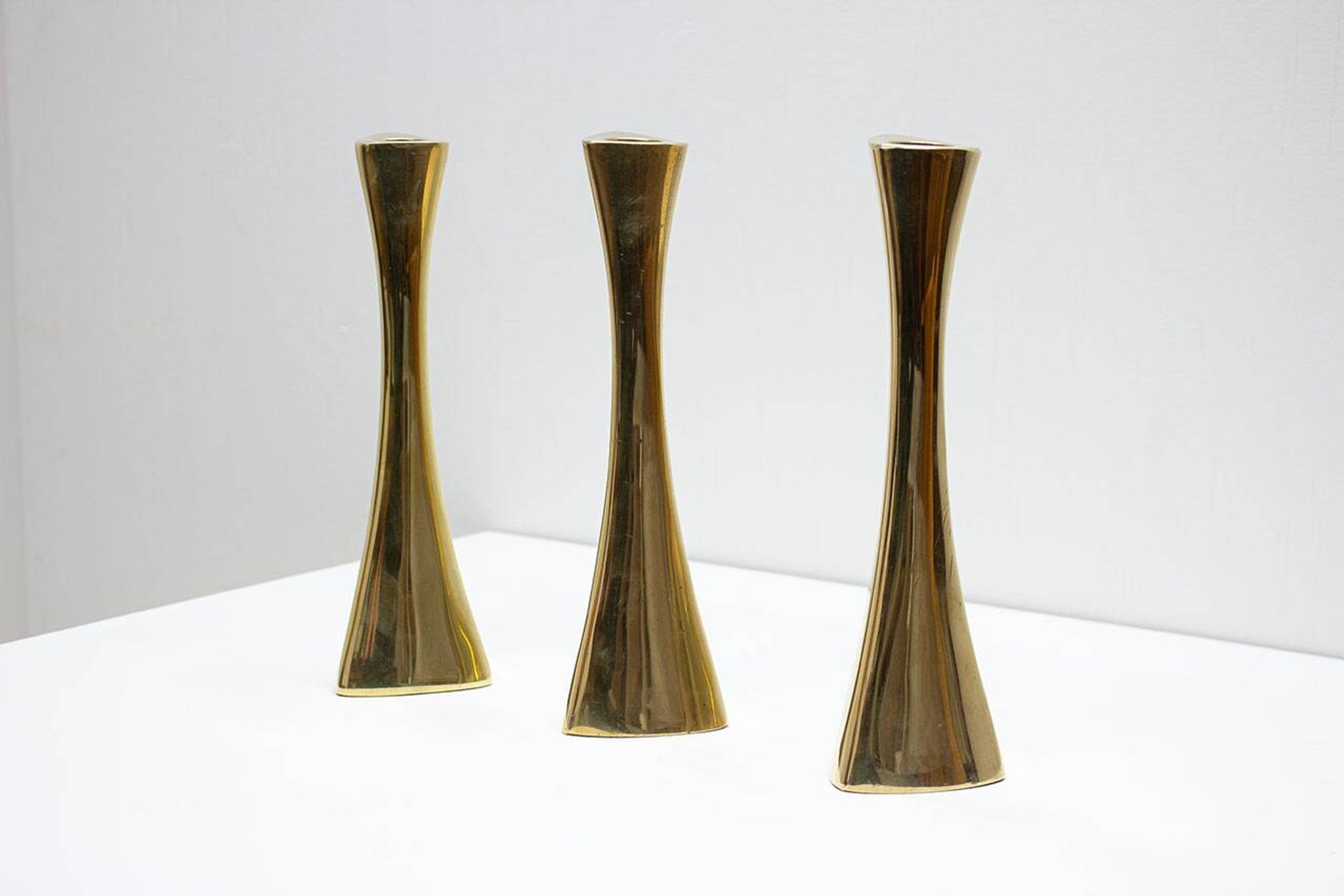 Set of 3 organic shaped brass candlesticks by K.E. Ytterberg, Sweden