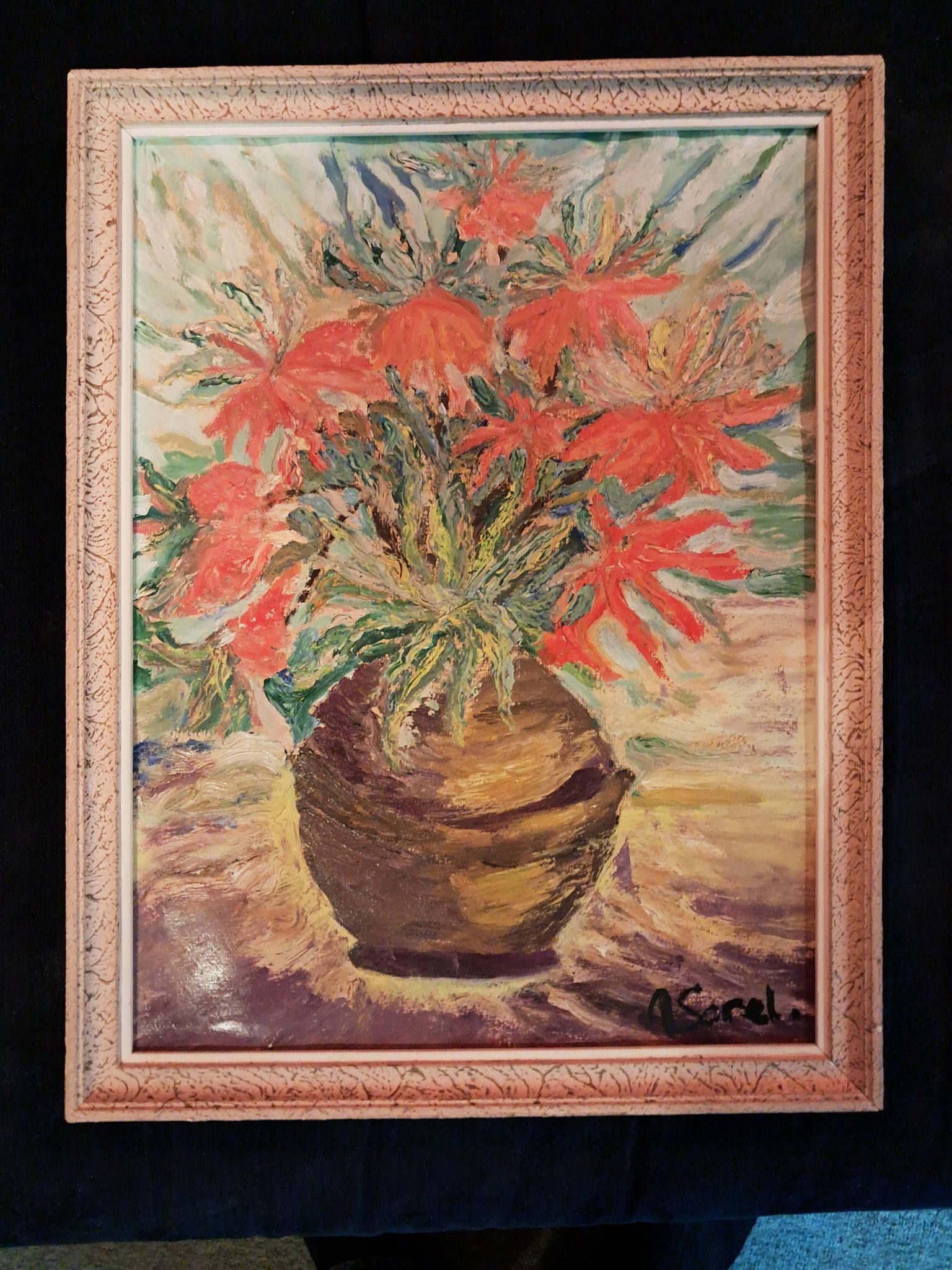 An old oil painting depicting a bouquet of flowers.