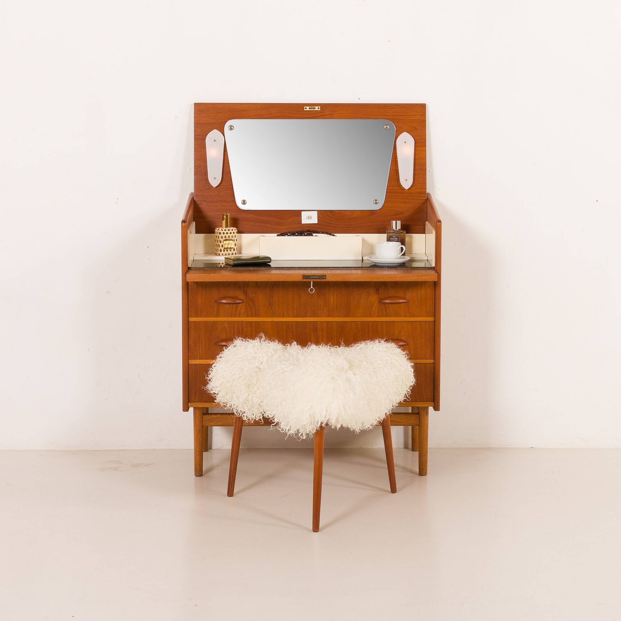 Danish teak dresser with hidden vanity and lights, 1960s