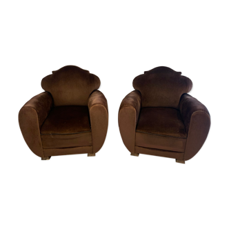 Pairs of brown velvet club armchairs