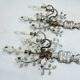 Paire de appliques en cristal et bronze Maison Bagues, années 1960.