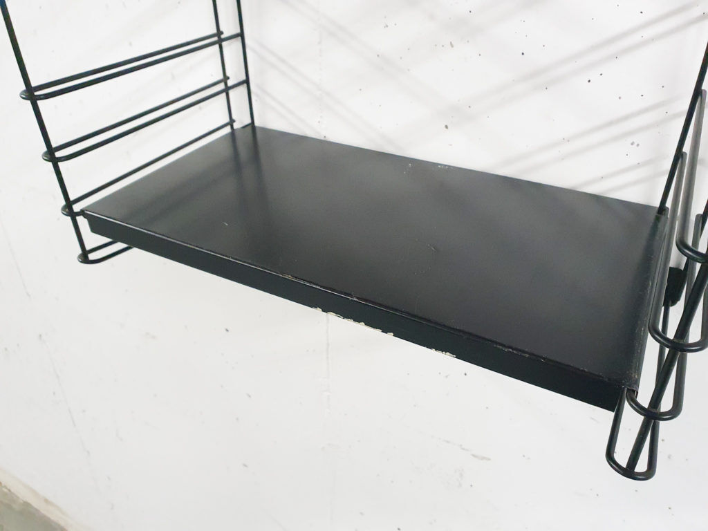 Red and black metal book shelves by Tomado, The Netherlands 1950's