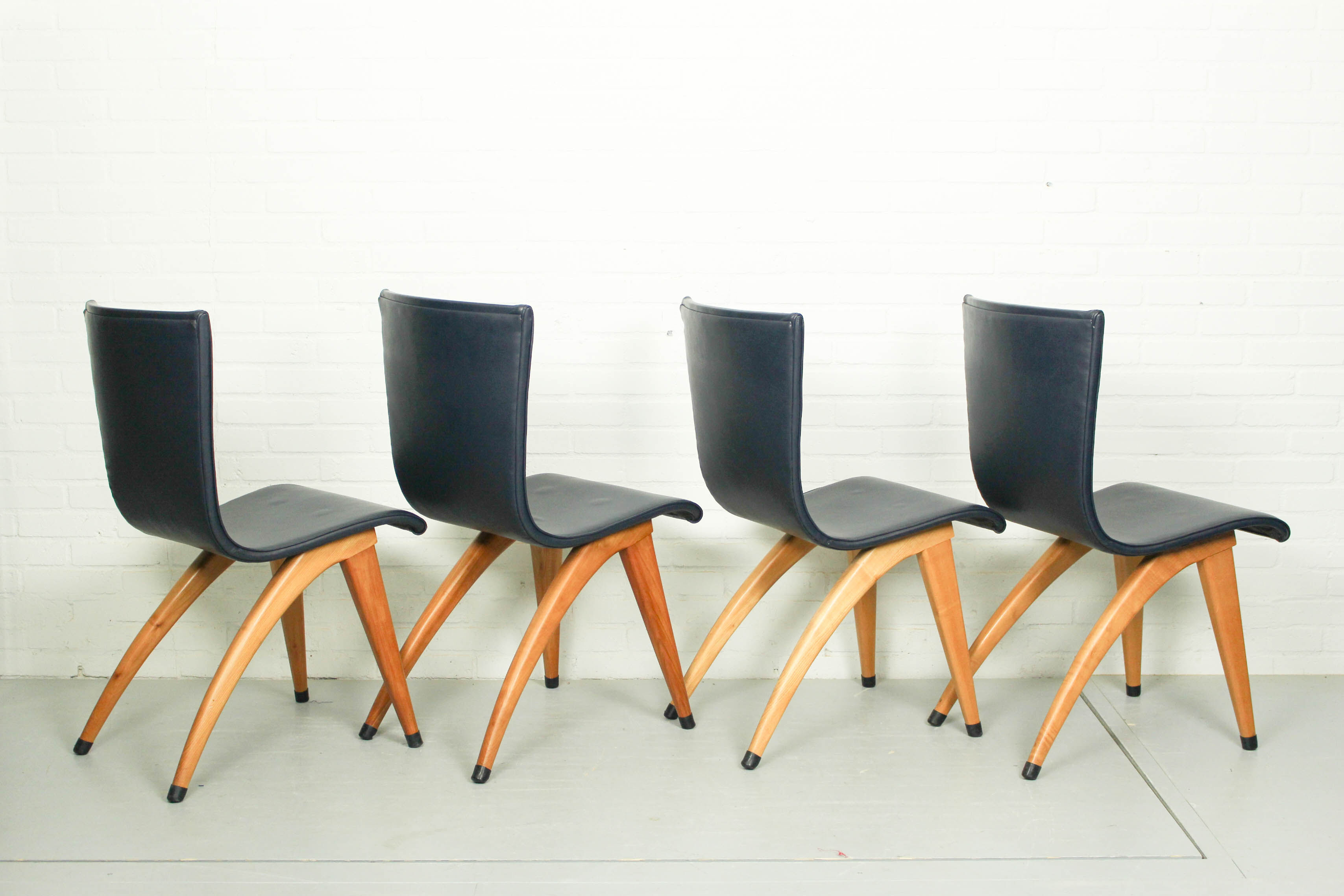 Set of 6 Cor van Os leatherette dining chair model Swing, 1960s