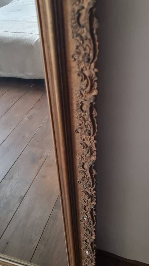 Antique Louis Philippe mirror with a pediment.