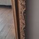 Antique Louis Philippe mirror with a pediment.