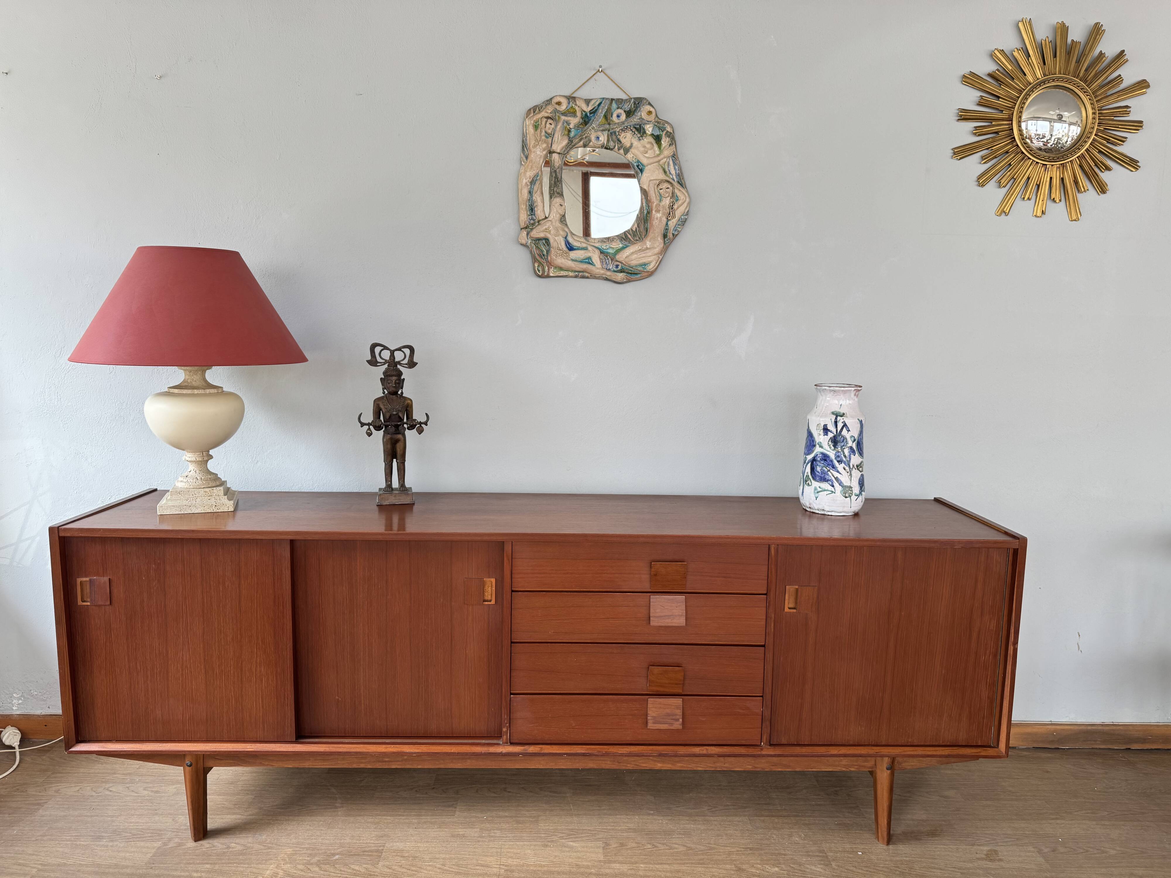 Scandinavian teak sideboard, 230 cm long, with 3 doors and 4 drawers.