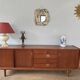Scandinavian teak sideboard, 230 cm long, with 3 doors and 4 drawers.