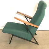 Lounge or easy chair with armrests