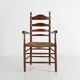 Antique wooden armchair with cane seat, France ca. 1900