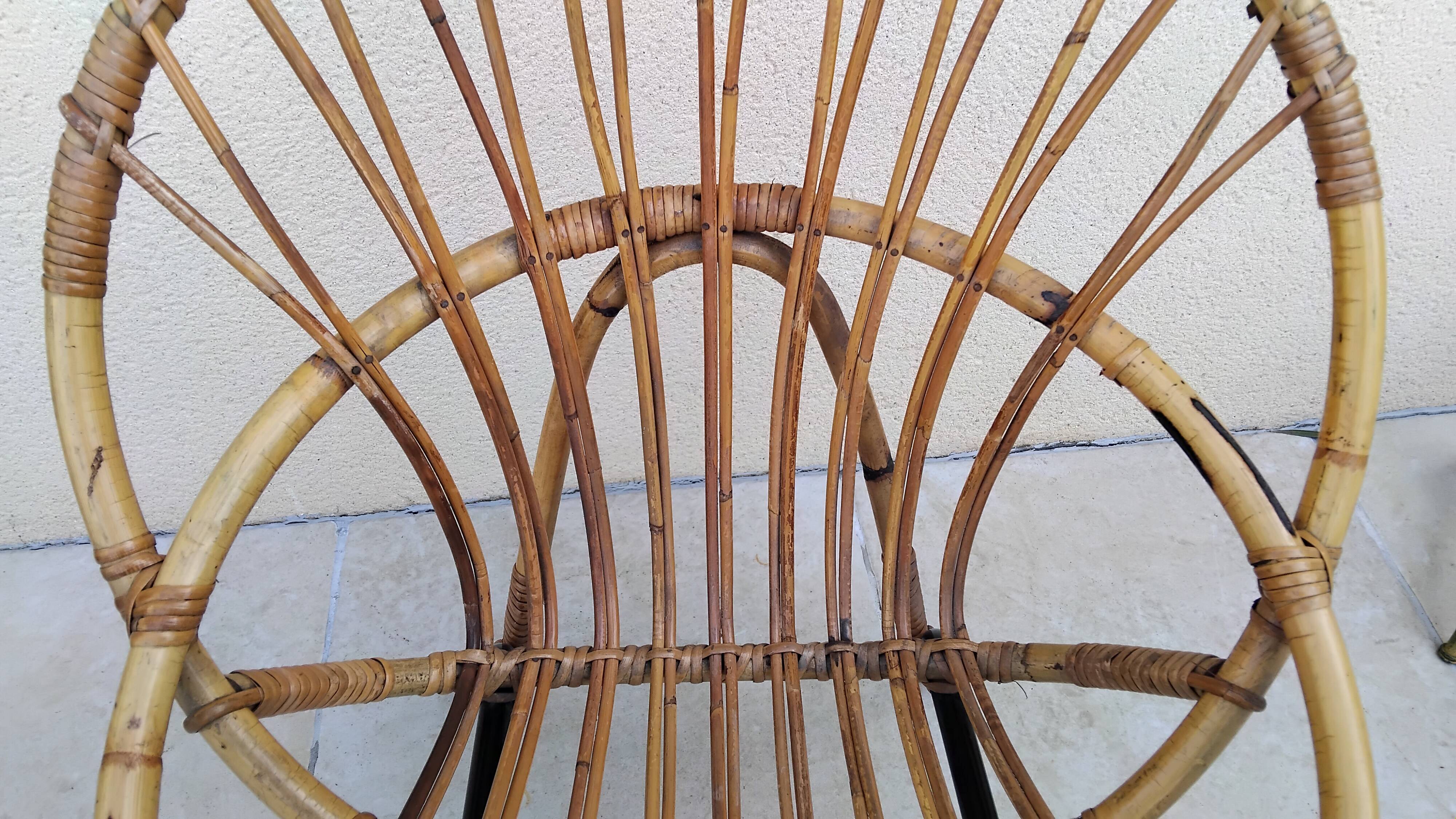 Vintage rattan armchair from the 50s and 60s.