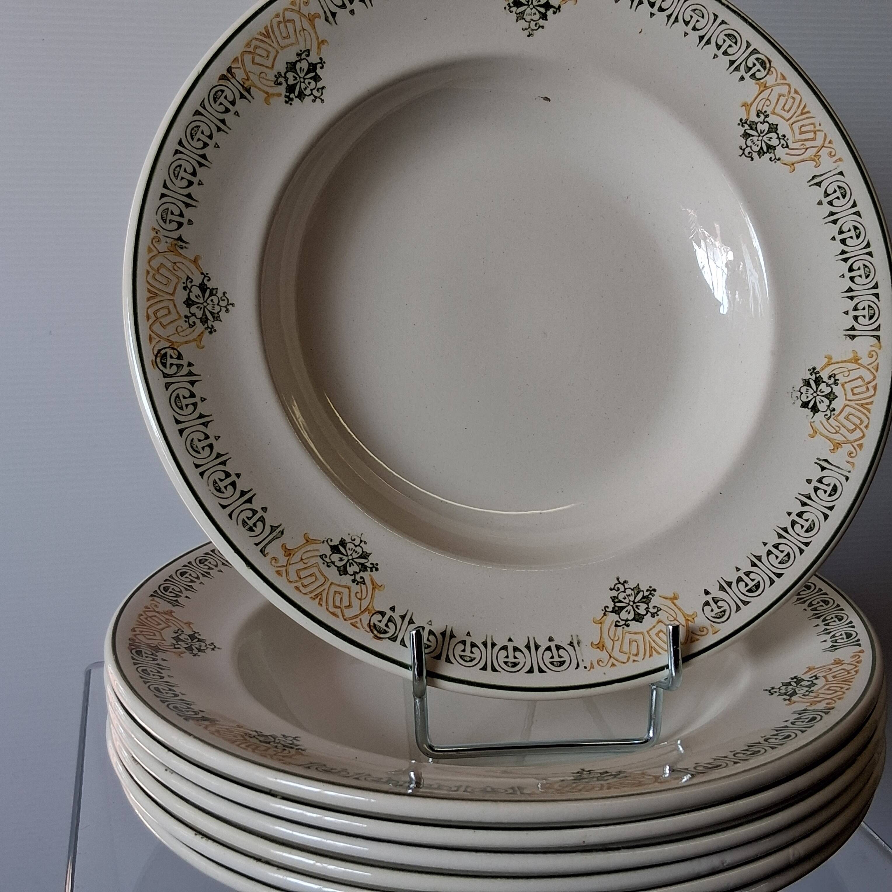 Set of 7 antique deep plates from Longwy, "Savigny" model, in good condition.