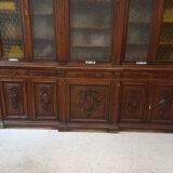 Glass-fronted walnut bookcase