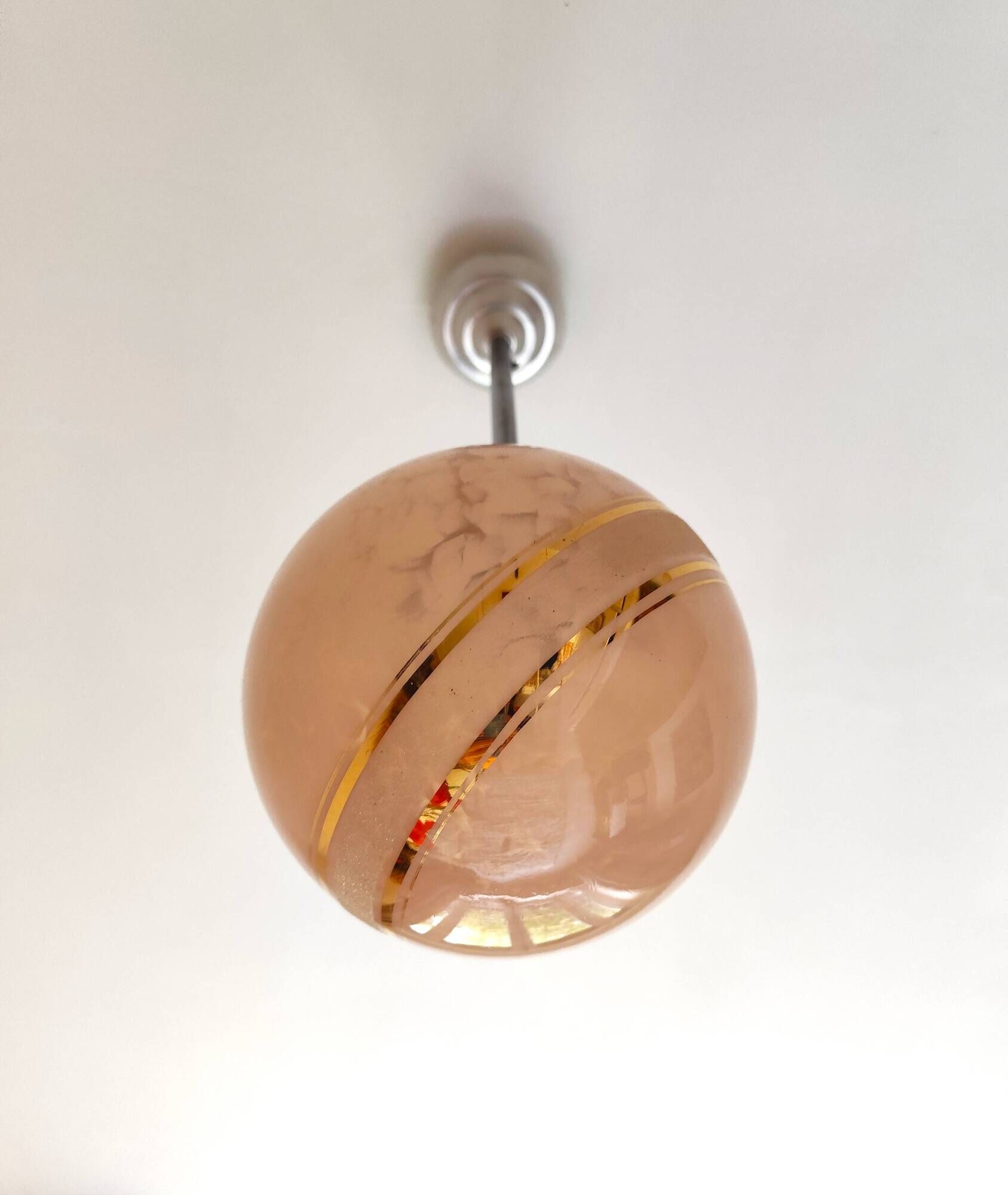 suspension glass globe pink and gold on a metal aluminium stem and structure
