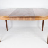 Dining table in teak with extensions, of Danish design from the 1960s.