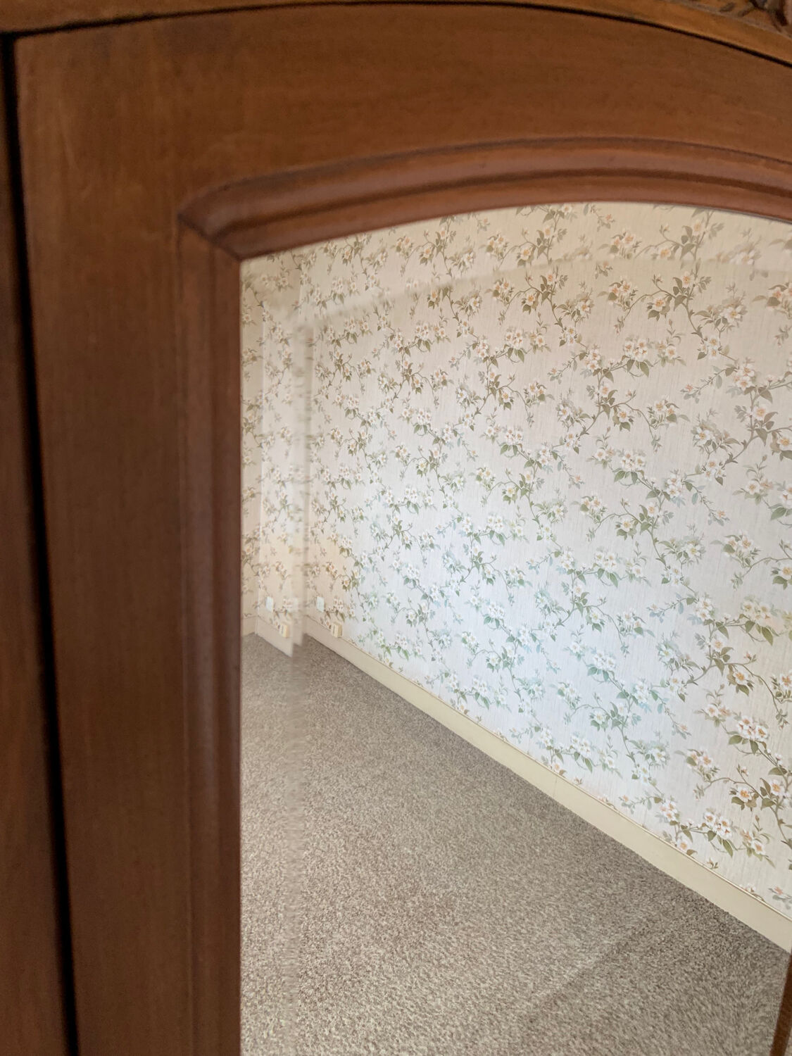 Art deco cabinet in carved wood