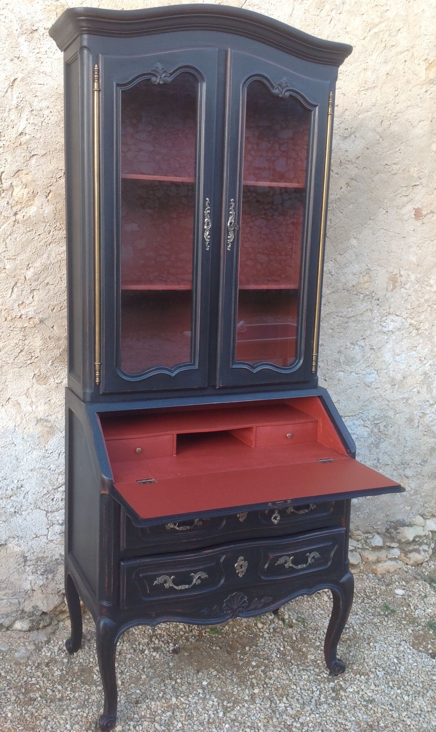 Louis XV style scriban bookcase in black and Basque red patinated cherry wood