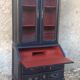 Louis XV style scriban bookcase in black and Basque red patinated cherry wood