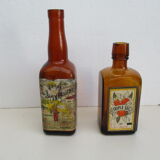 2 amber glass bottles with their old labels