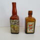 2 amber glass bottles with their old labels