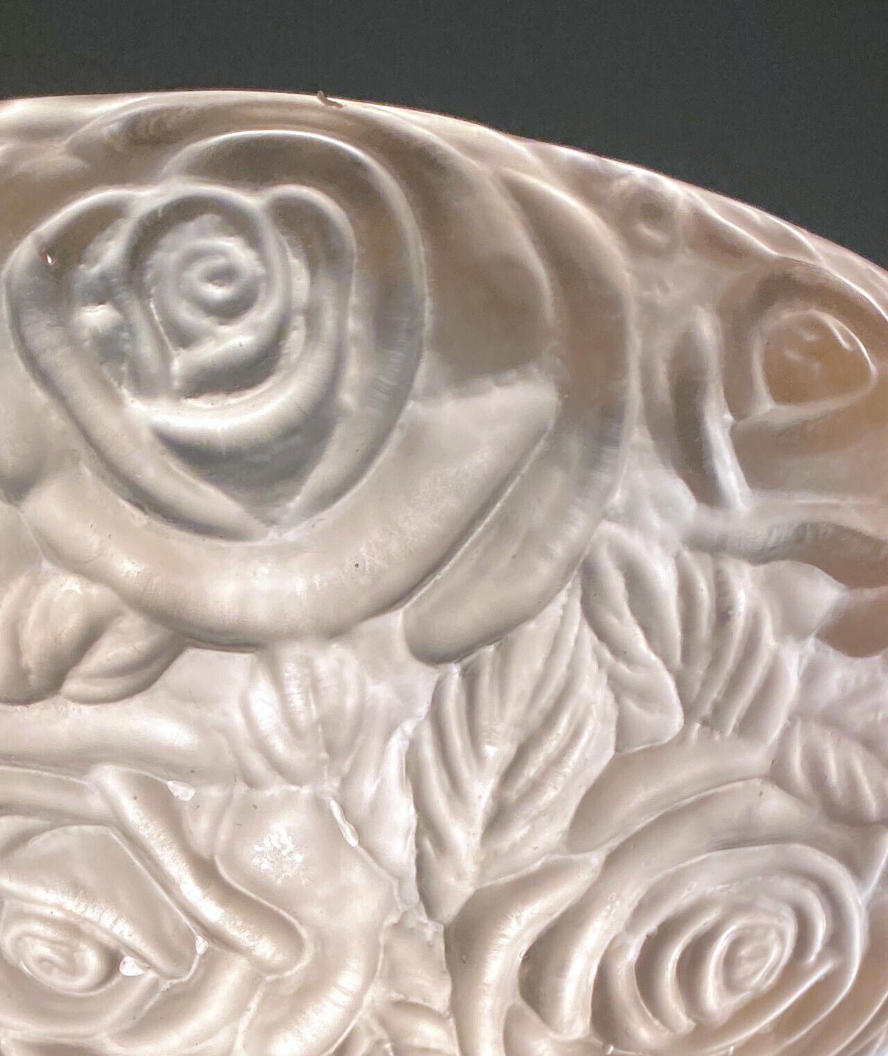 Art Deco wall lamp (1930) with rose patterns in molded pressed glass