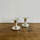 Pair of silver metal candle holders