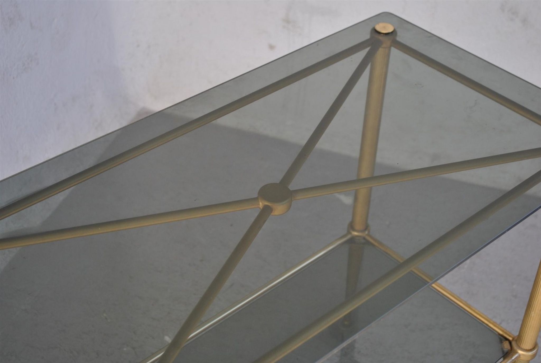 Serving style 1940 on gilded bronze smoked glass top