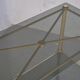 Serving style 1940 on gilded bronze smoked glass top