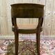 Fauteuil de bureau Louis Philippe en noyer et cannage