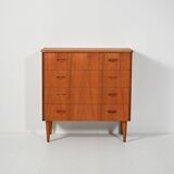 Scandinavian teak chest of drawers with sculpted recessed pulls