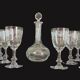 9 crystal white wine glasses from St. Louis model Cléo and their decanter.