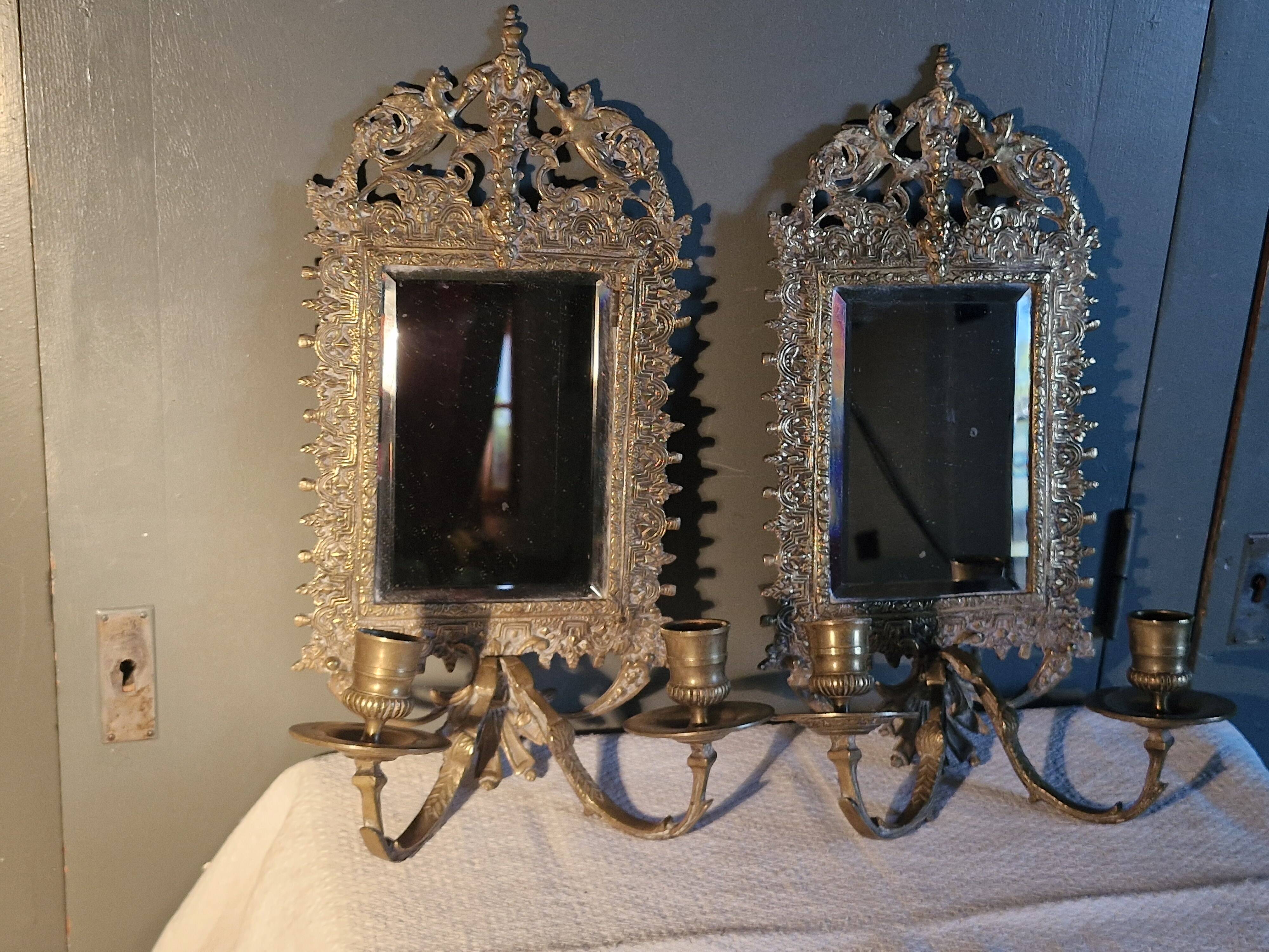 Pair of mirror sconces/candle holders in 19th-century bronze.