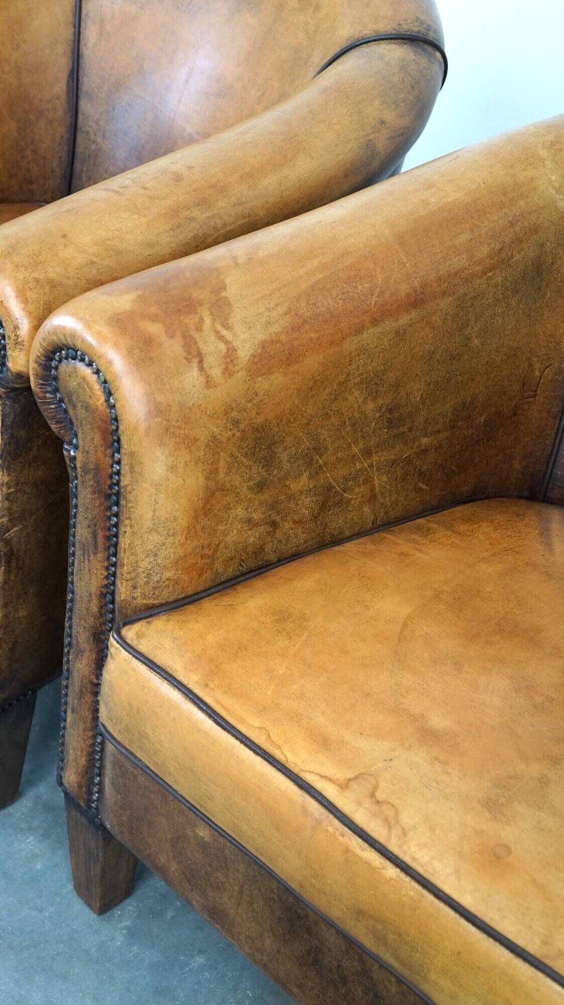 Set of 2 stylish yet beautiful and comfortable sheepskin club armchairs