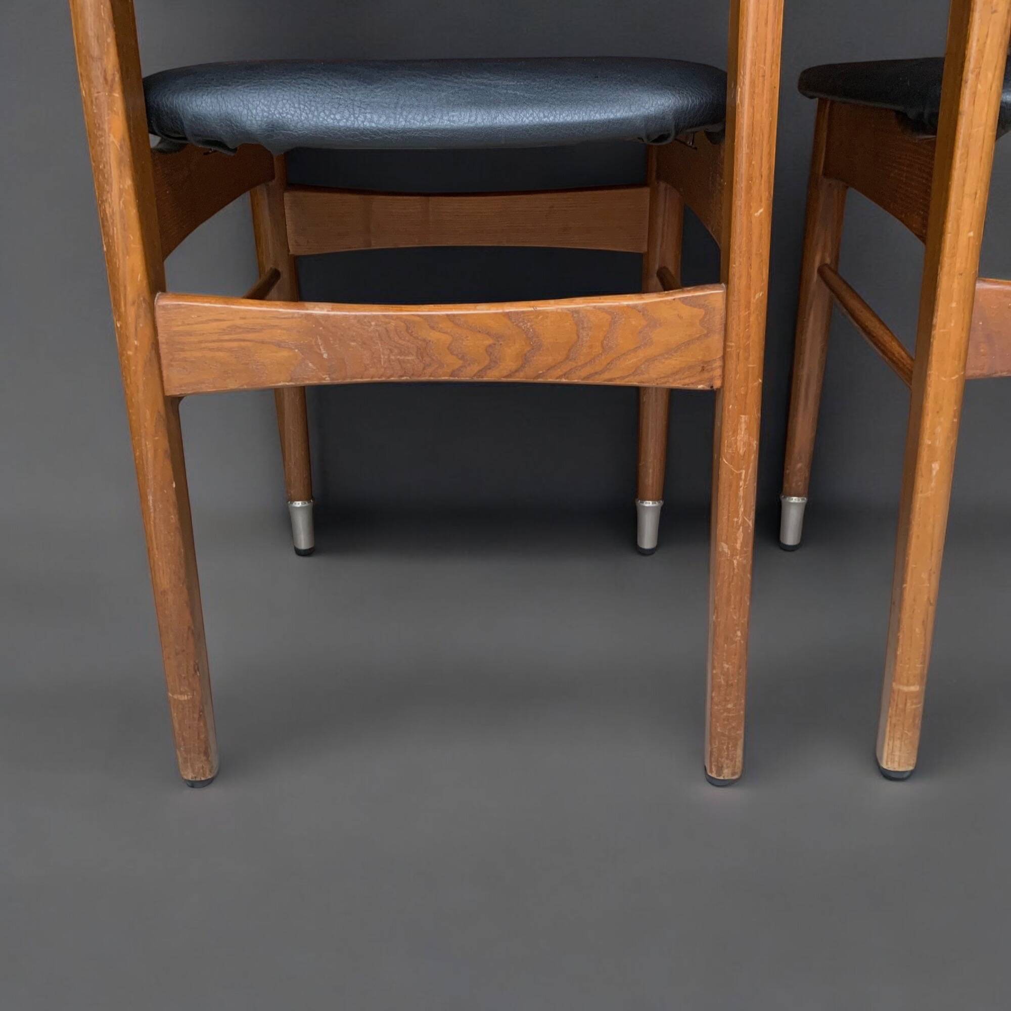 Pair of Scandinavian chairs in wood and black skai