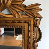 Gilded wooden pediment mirror