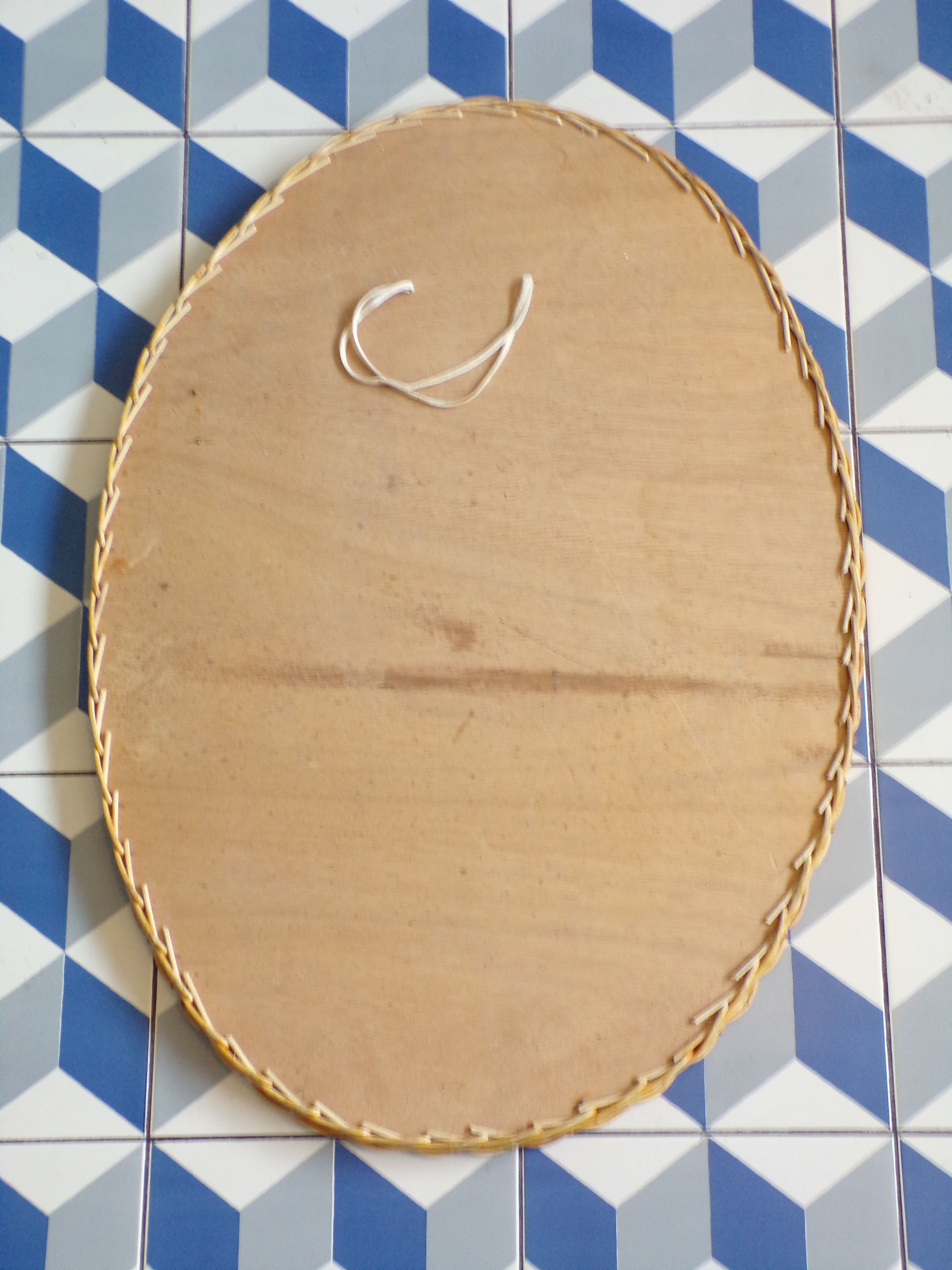 Oval vintage rattan mirror