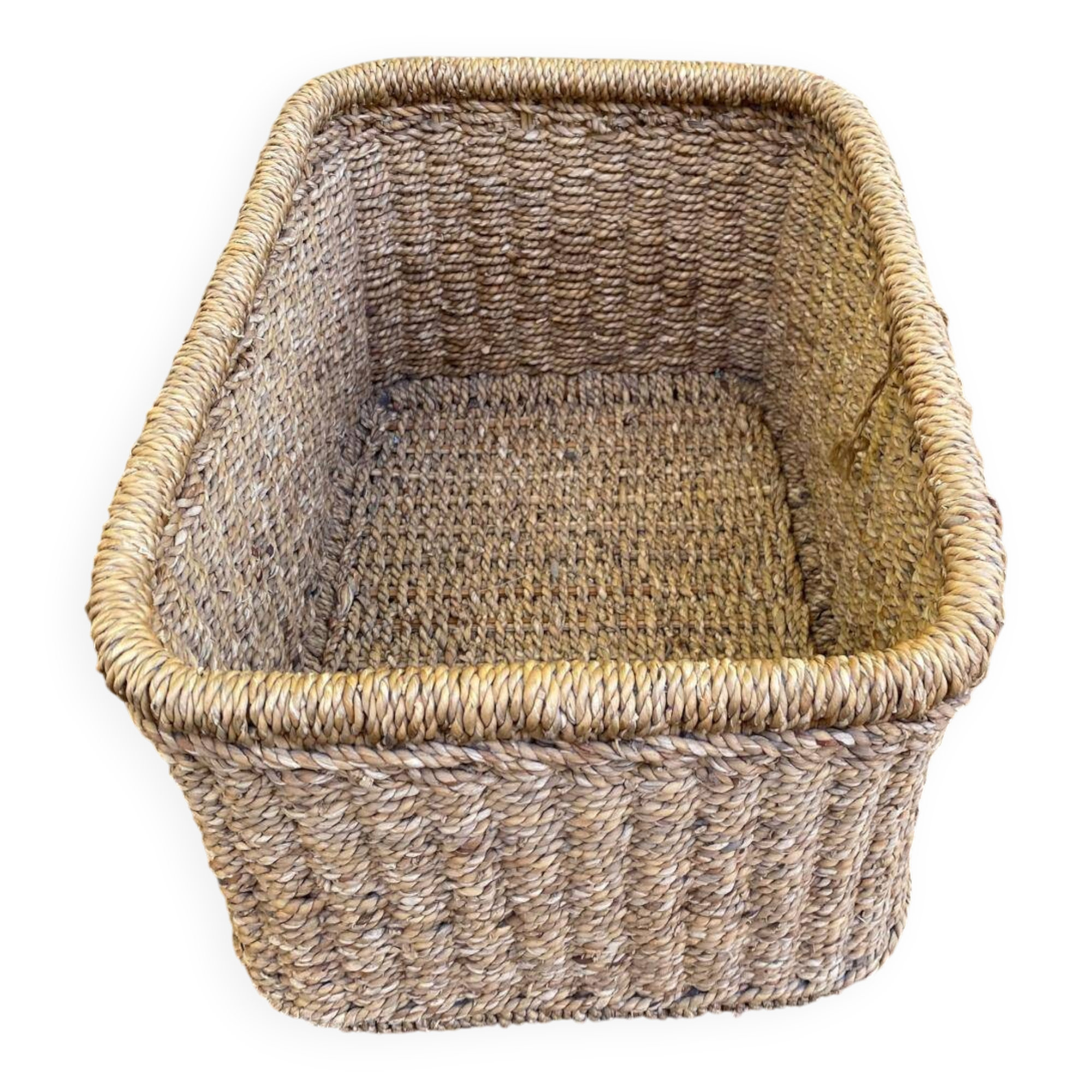 Large basket / rectangular storage bin made of woven natural fibre.
