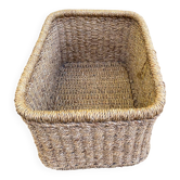 Large basket / rectangular storage bin made of woven natural fibre.