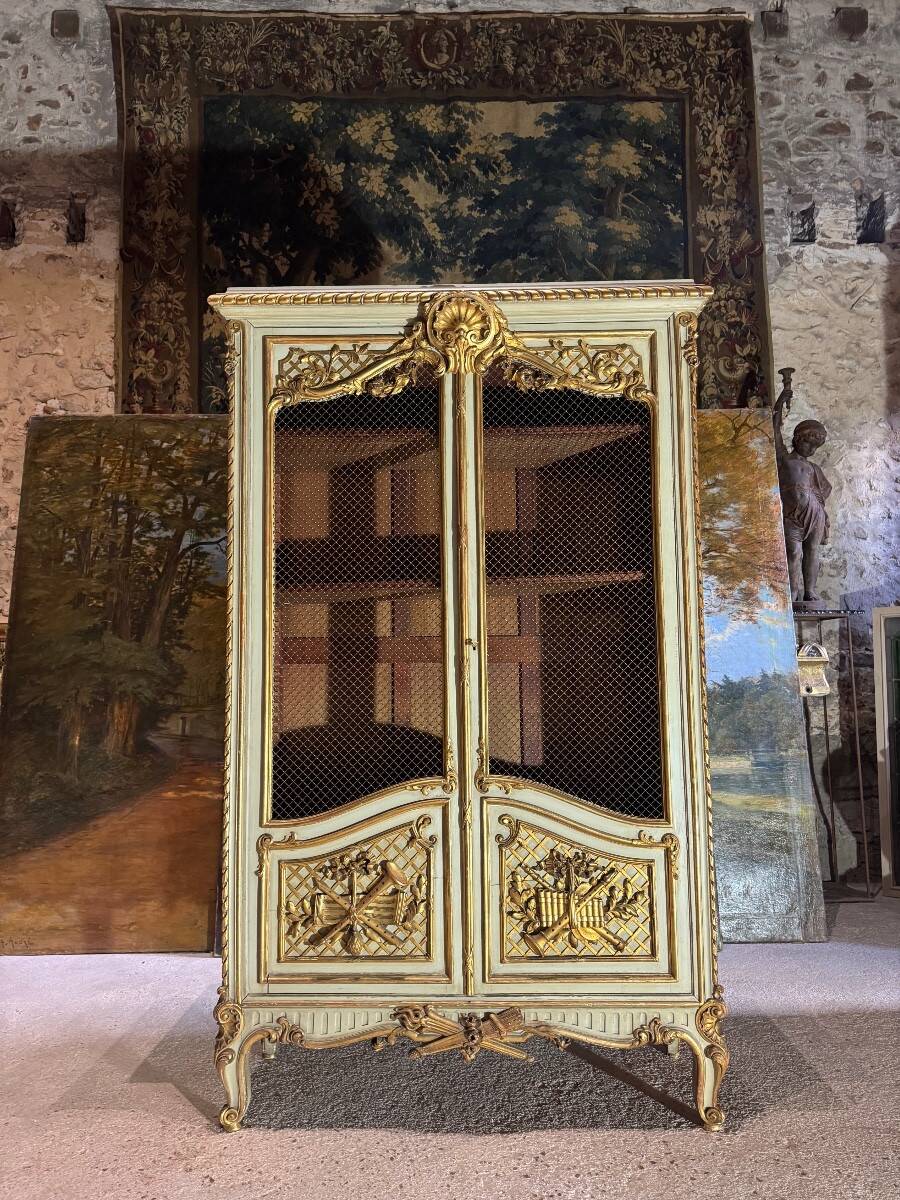 Bookcase in gilded wood and restored wood from the Napoleonic III period.