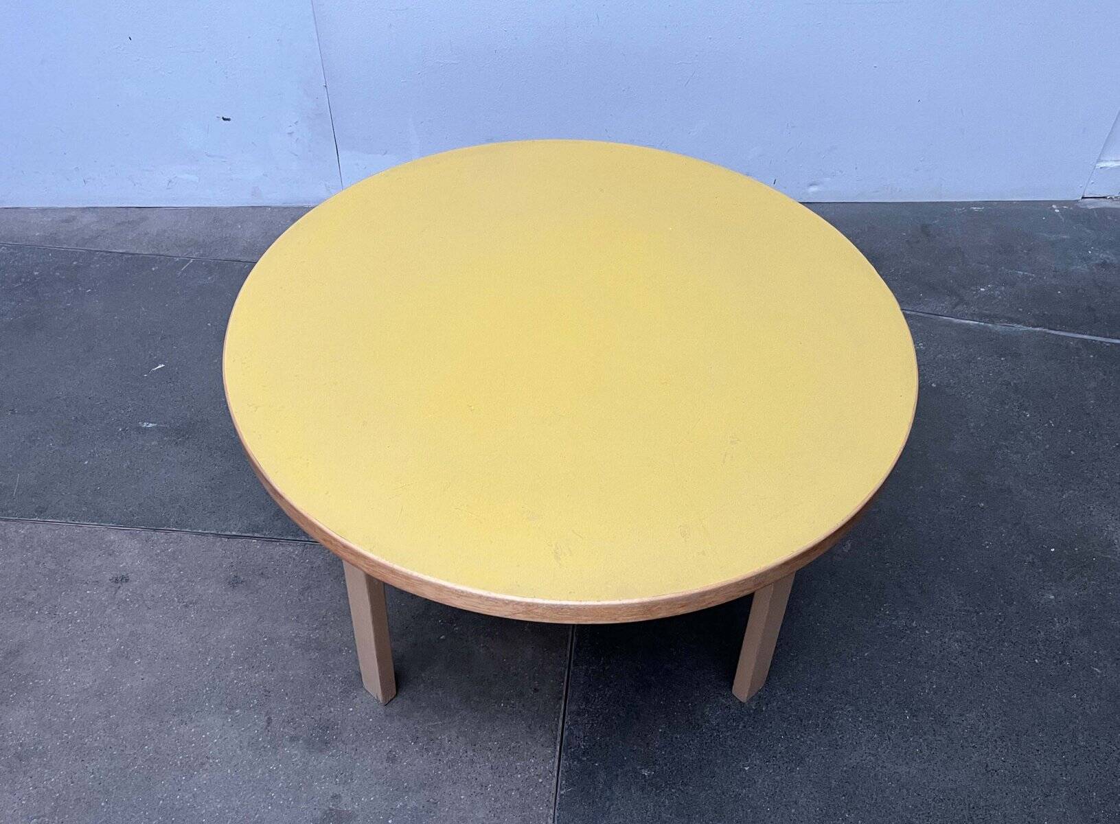 Mid-century modern yellow linoleum coffee table by Alva Aalto for Artek, Finland, 1960s.
