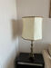 Vintage table lamp in chiselled bronze with a hexagonal shade.