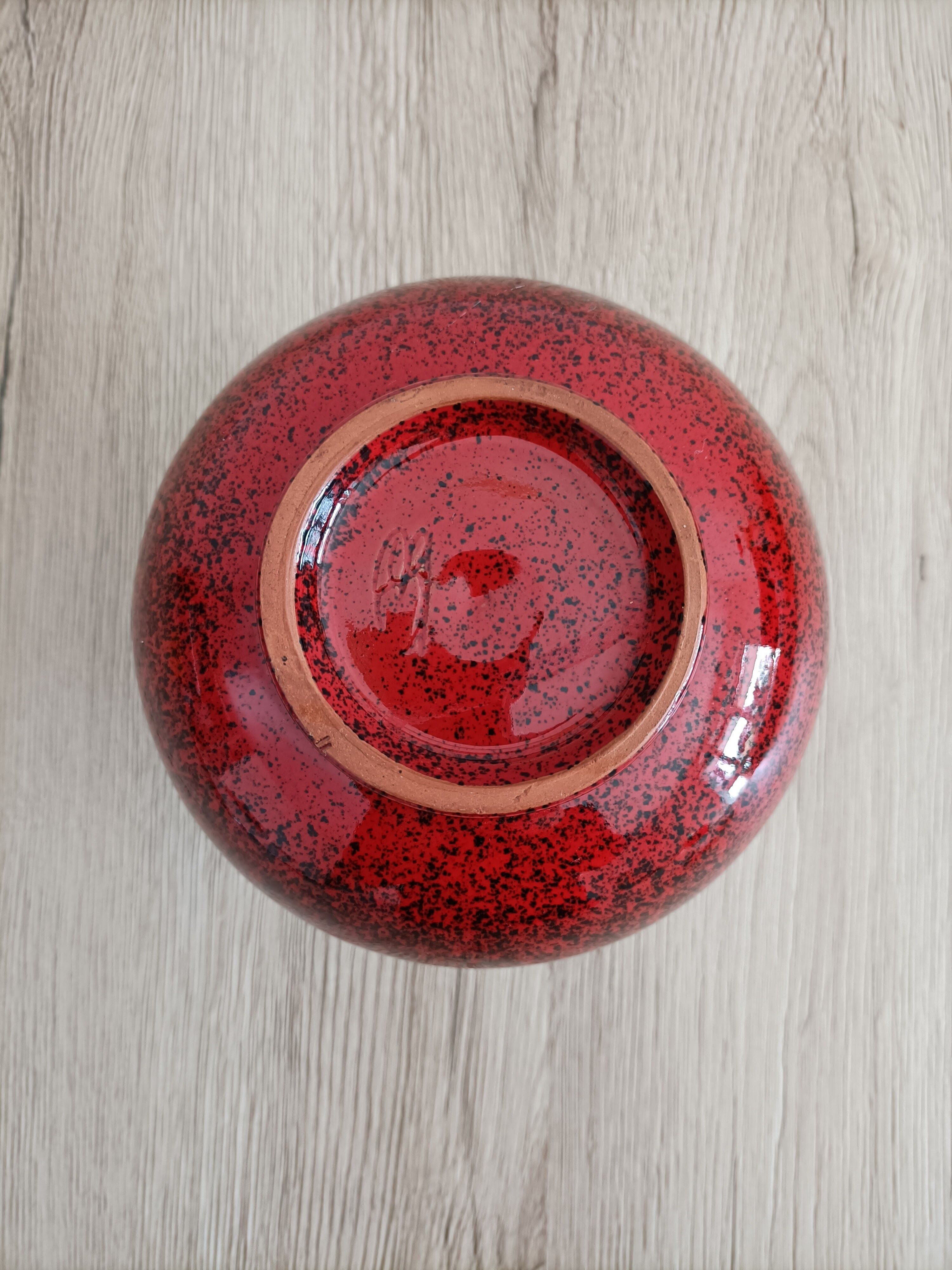 Red and black ceramic vase or pot cover
