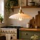Suspension in pleated opaline