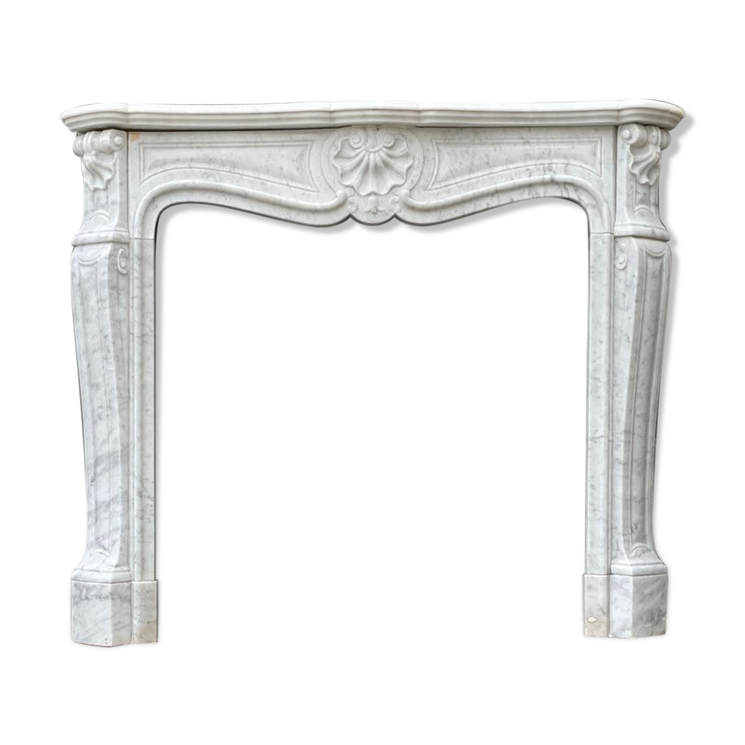 Louis XV style fireplace in Carrara marble