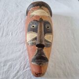 Wooden mask baule carved and hand painted with natural pigments from ivory coast