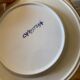 6 white vintage plates with blue flowers