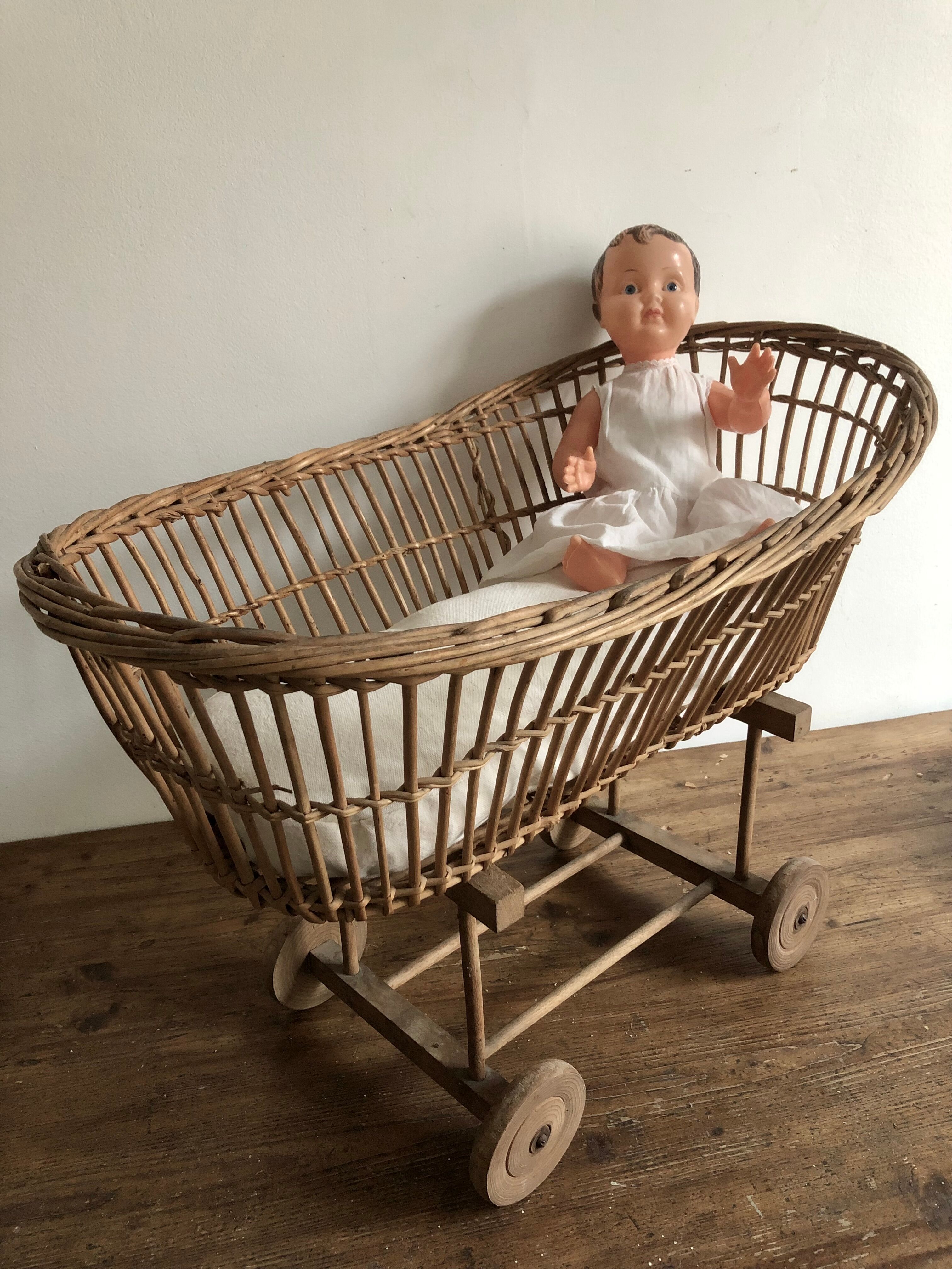 Antique toy, wicker doll cradle