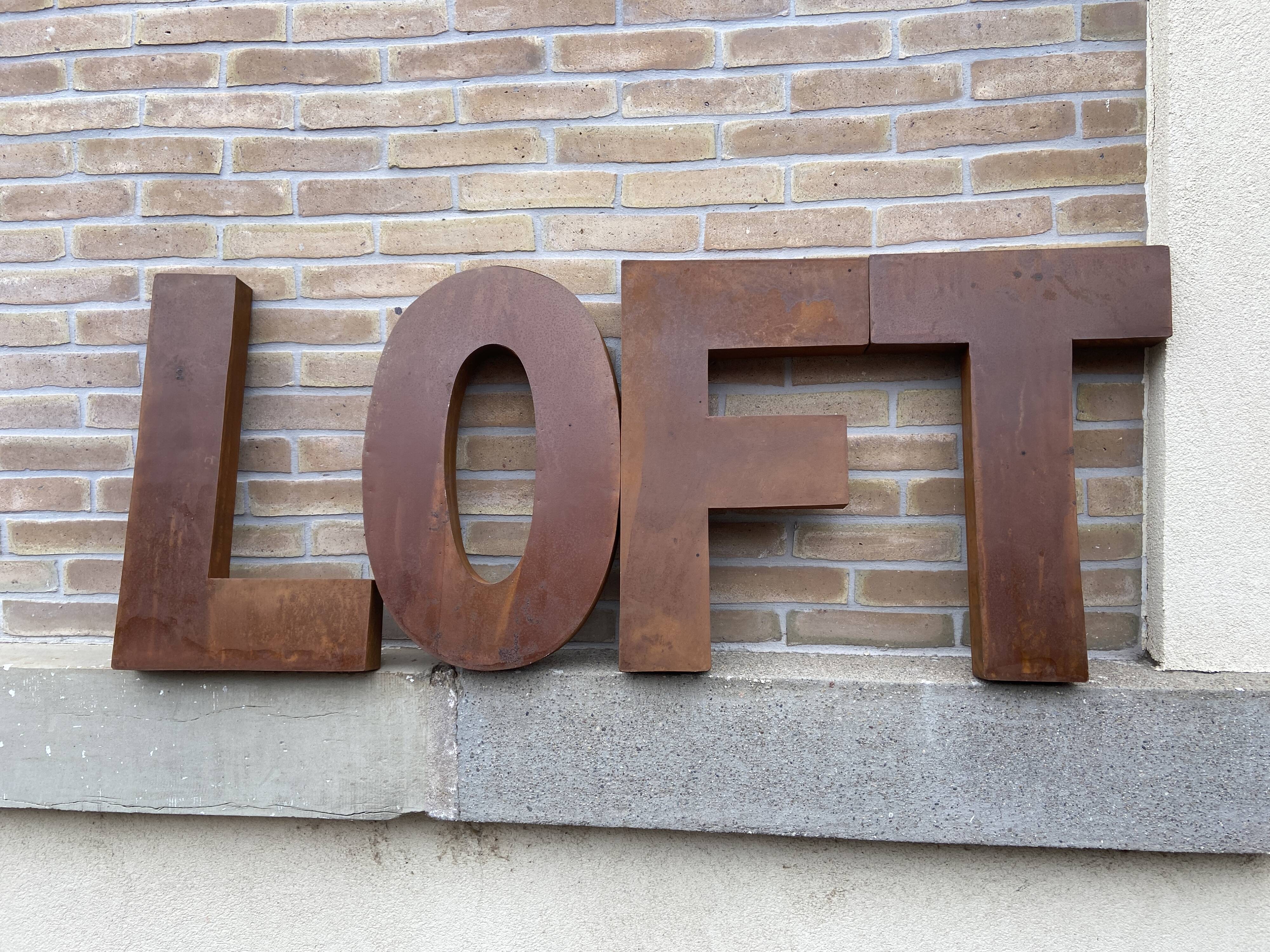 LOFT sign in vintage metal letters